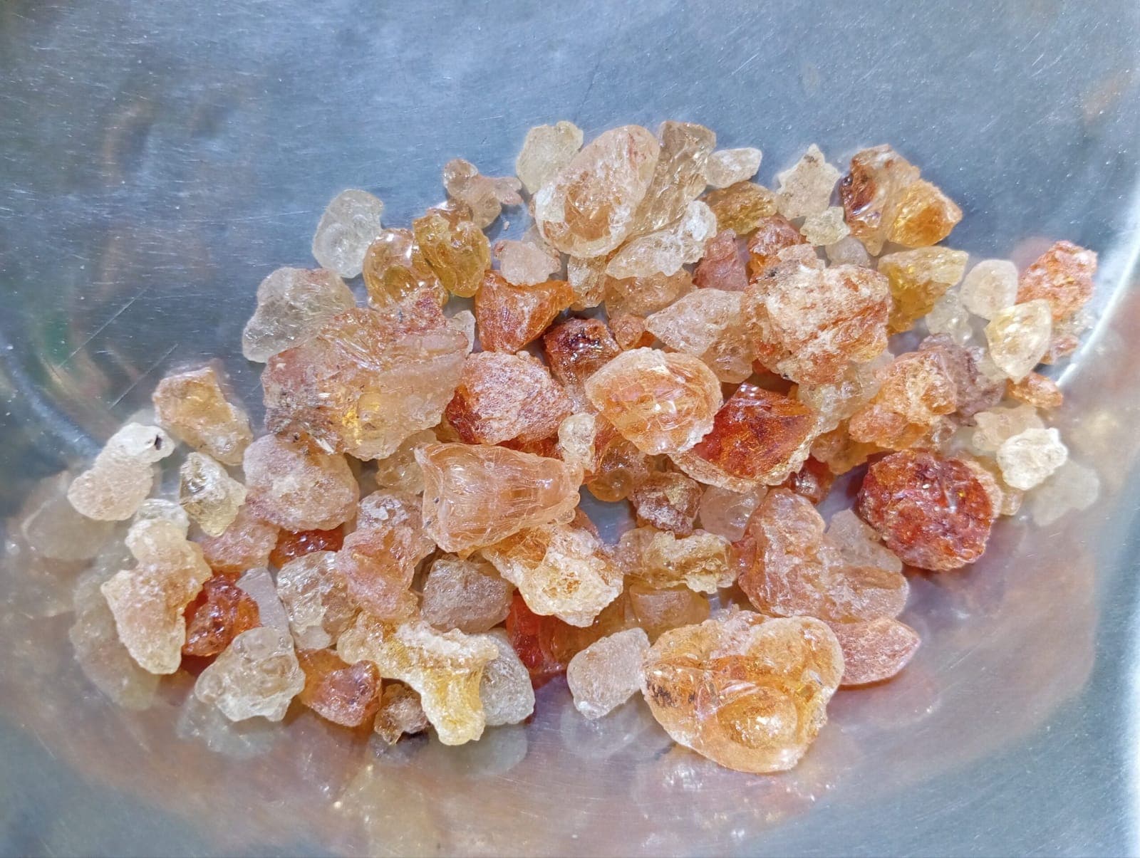 BM cheerh gond, pieces of edible gum, in a steel bowl