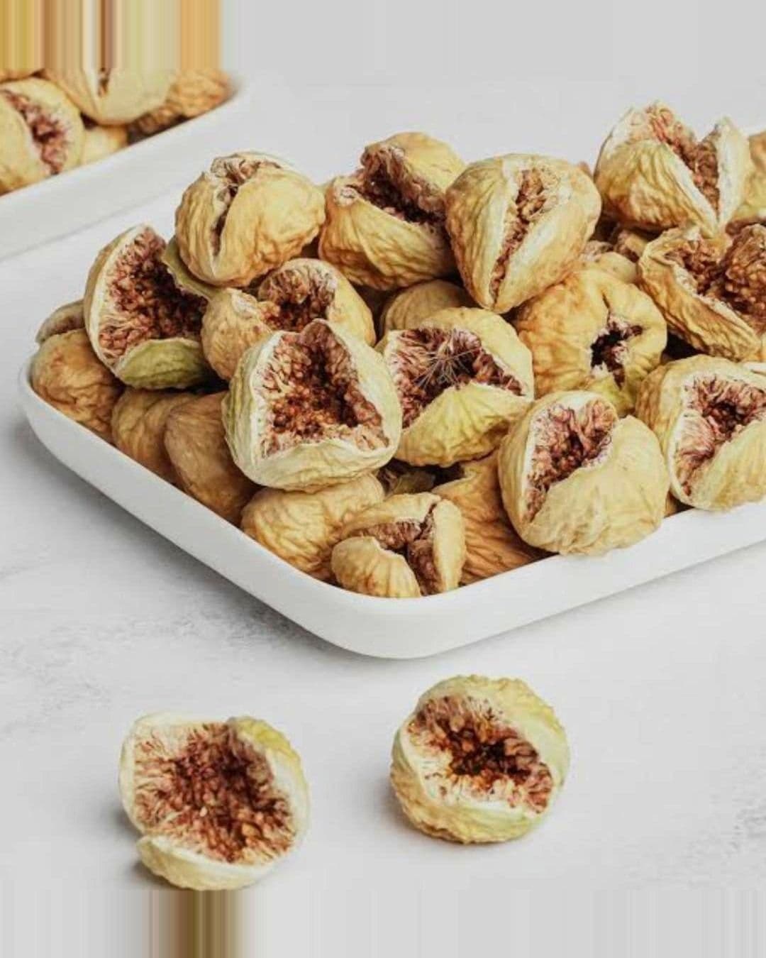 BM Irani anjeer, dried figs, on a white tray