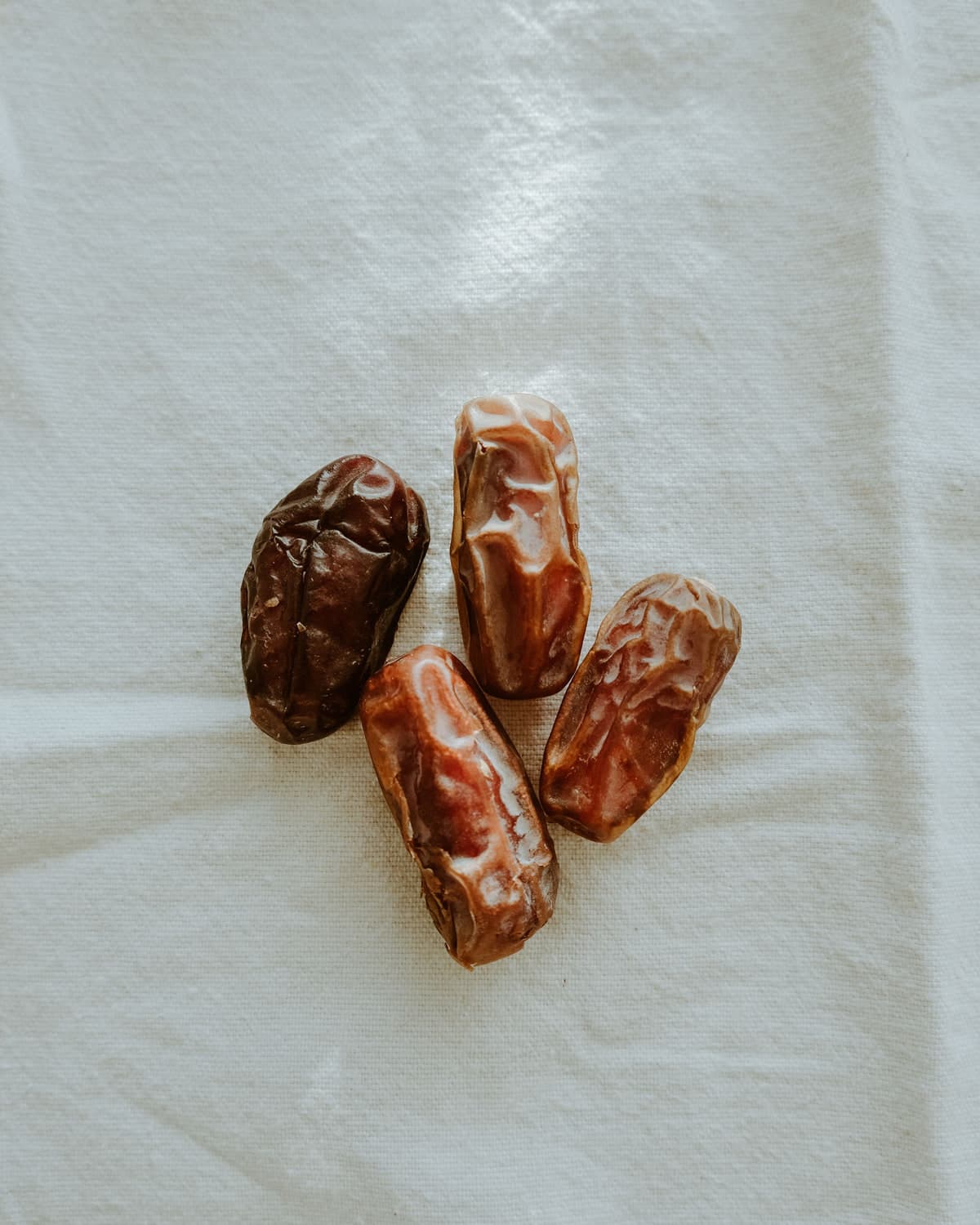 BM Mariam dates on white linen