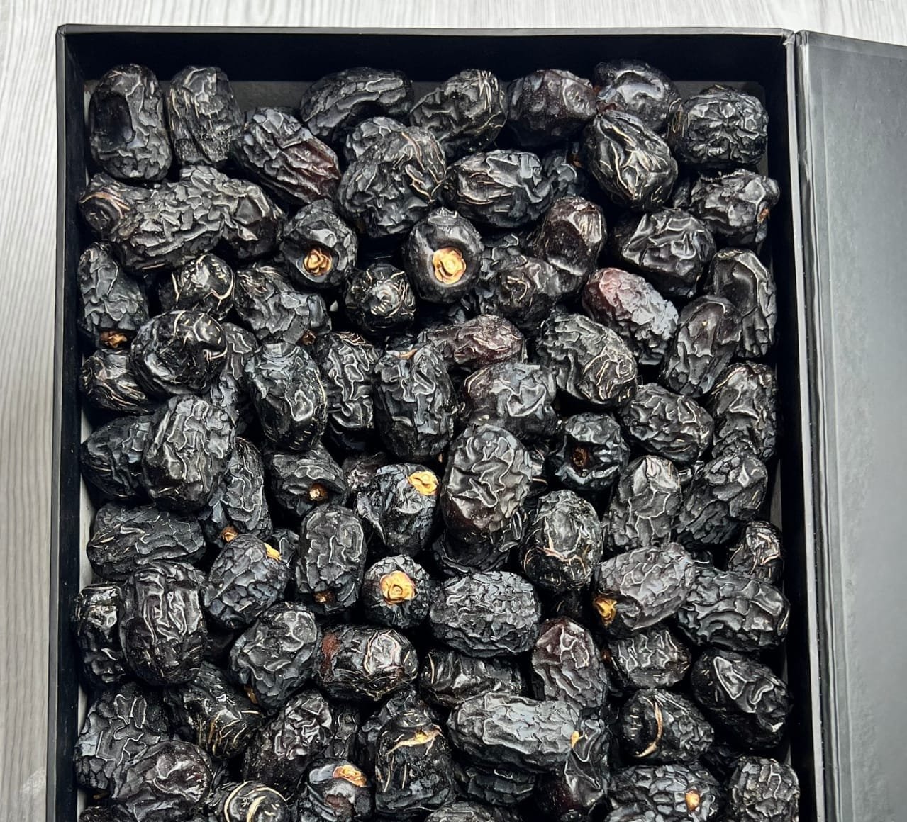 BM Ajwa dates in a black box