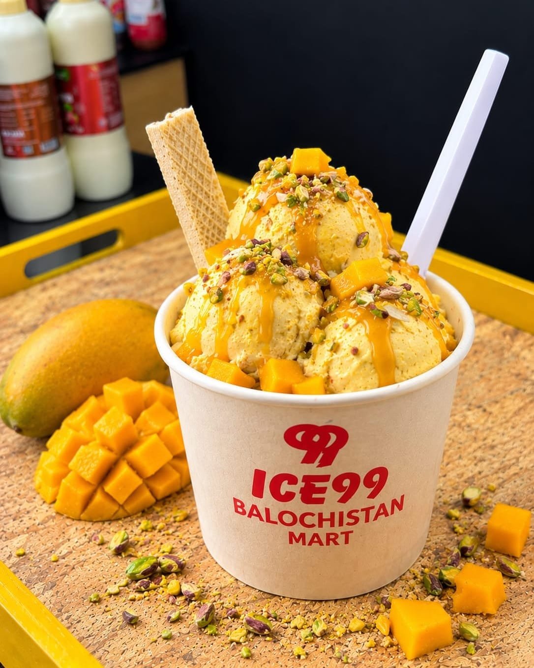 ICE99 mango ice cream with mango cubes in a Balochistan Mart cup